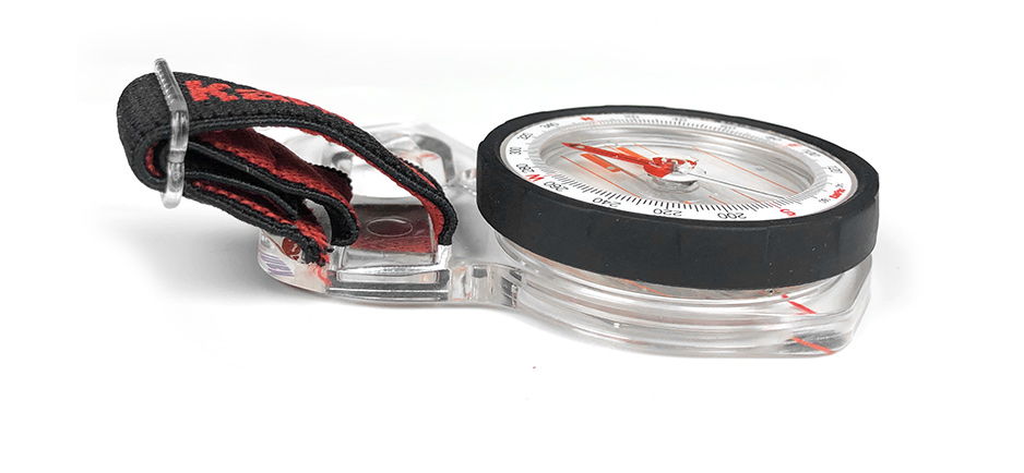Durable Kanpas compass with reinforced housing for adventure racing.