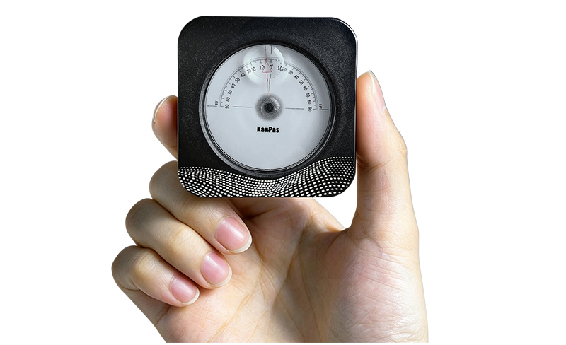 Kanpas Clinon Cli180 compact pocket clinometer shown to demonstrate its small portable size