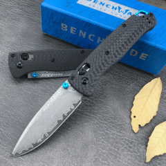 Damascus steel blade + carbon fiber handle