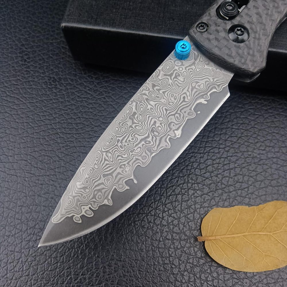 Tactical folding knife, textured grip carbon fiber handle with blue accents, ergonomic EDC camping knife suitable for outdoor survival and daily carrying, high hardness blade, spear tip Damascus steel blade, good gift, knife fan collector
