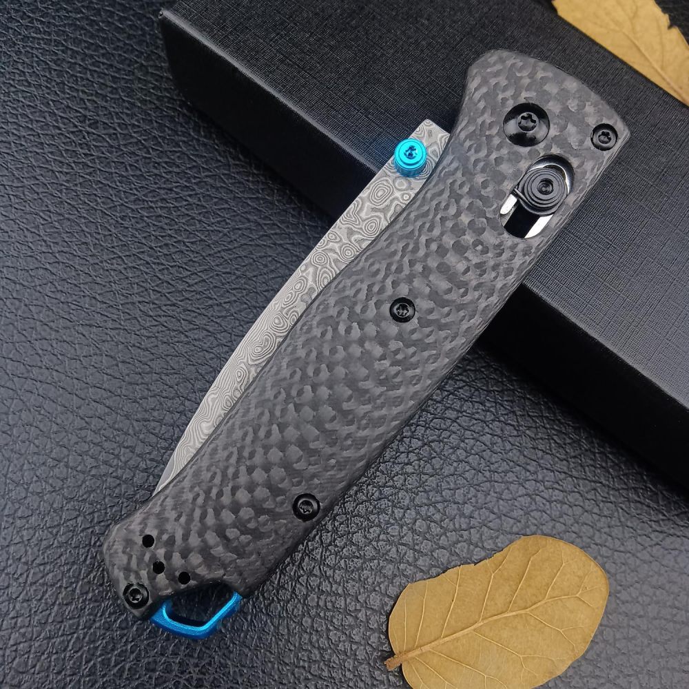Tactical folding knife, textured grip carbon fiber handle with blue accents, ergonomic EDC camping knife suitable for outdoor survival and daily carrying, high hardness blade, spear tip Damascus steel blade, good gift, knife fan collector