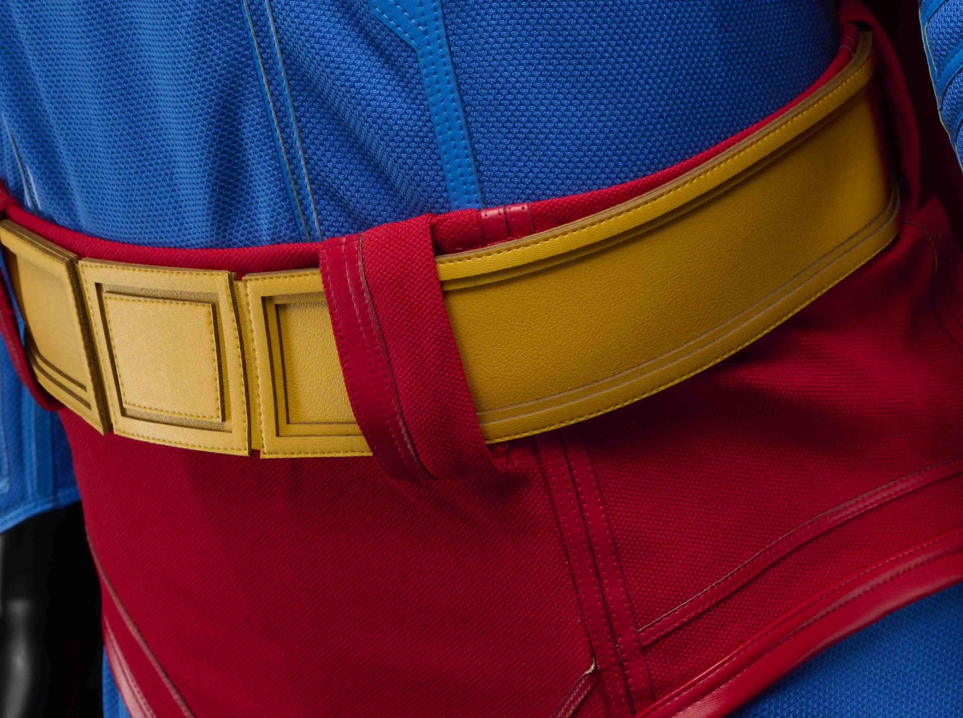 Adjustable Velcro belt on Superman costume for customizable fit