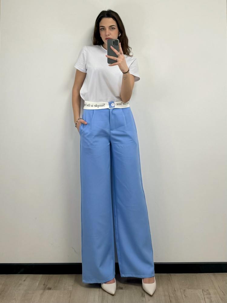 Pantaloni con scritta