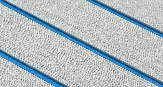 Faux teak boat flooring that offers the look of real wood with enhanced durability and easy maintenance.