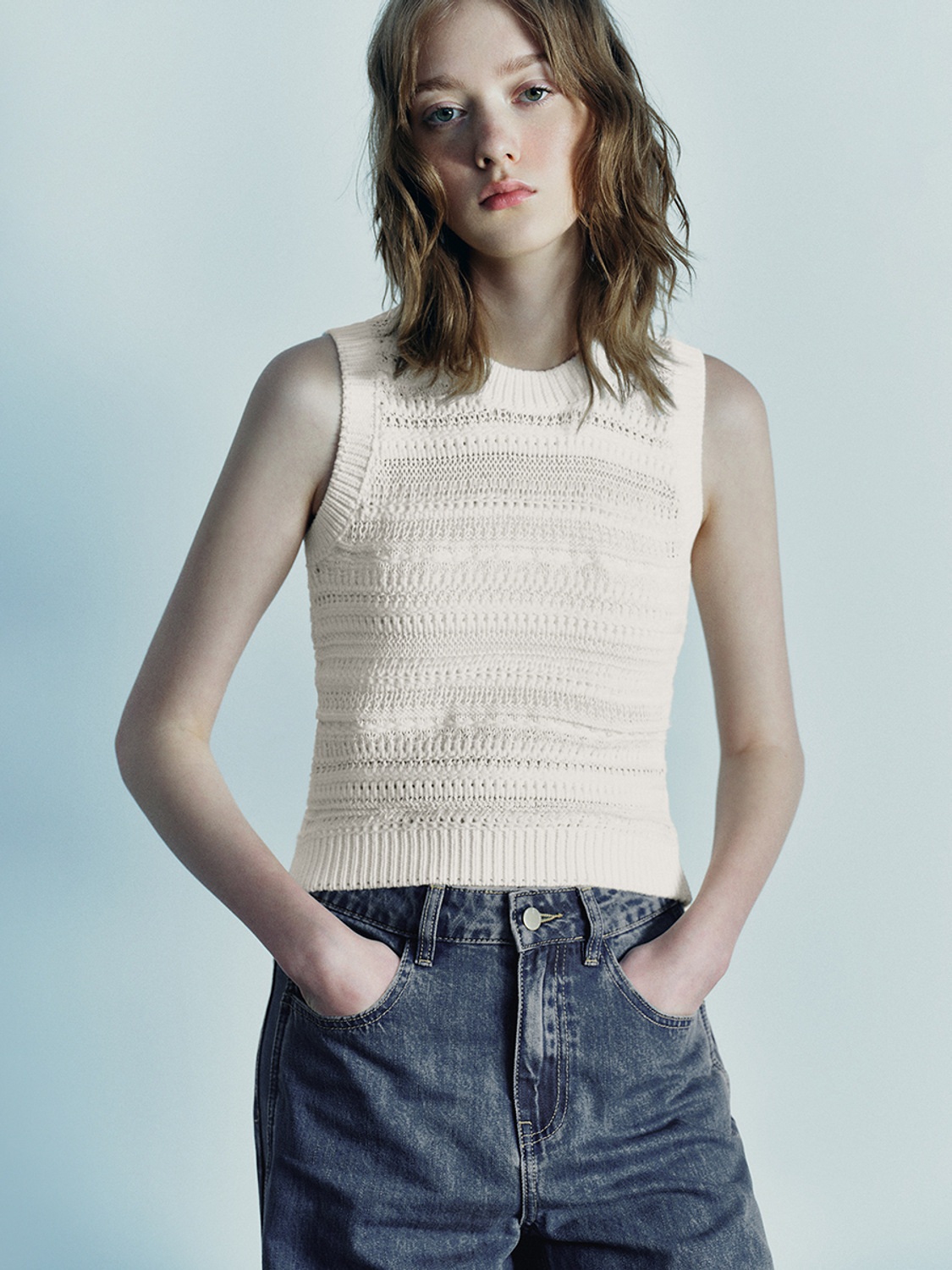 Supply Sleeveless cropped knitted crewneck top