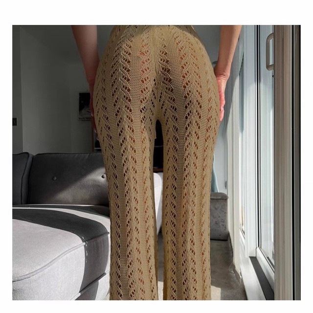 Seaside hot spring holiday women's summer dress sexy lace-up design sense hollow-out crochet knitted sunscreen straight-leg pants