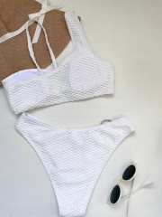 Europe and the United States sexy solid color three-point bikini one-shoulder swimsuit female split hot spring vacation beach sexy swimsuit