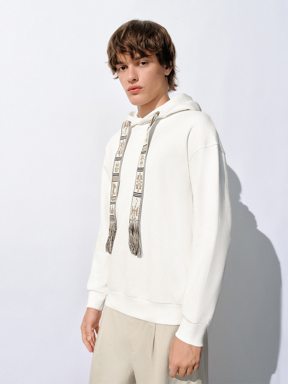 Custom Men's Boho-Inspired Hooded Sweatshirt with Decorative Drawstrings