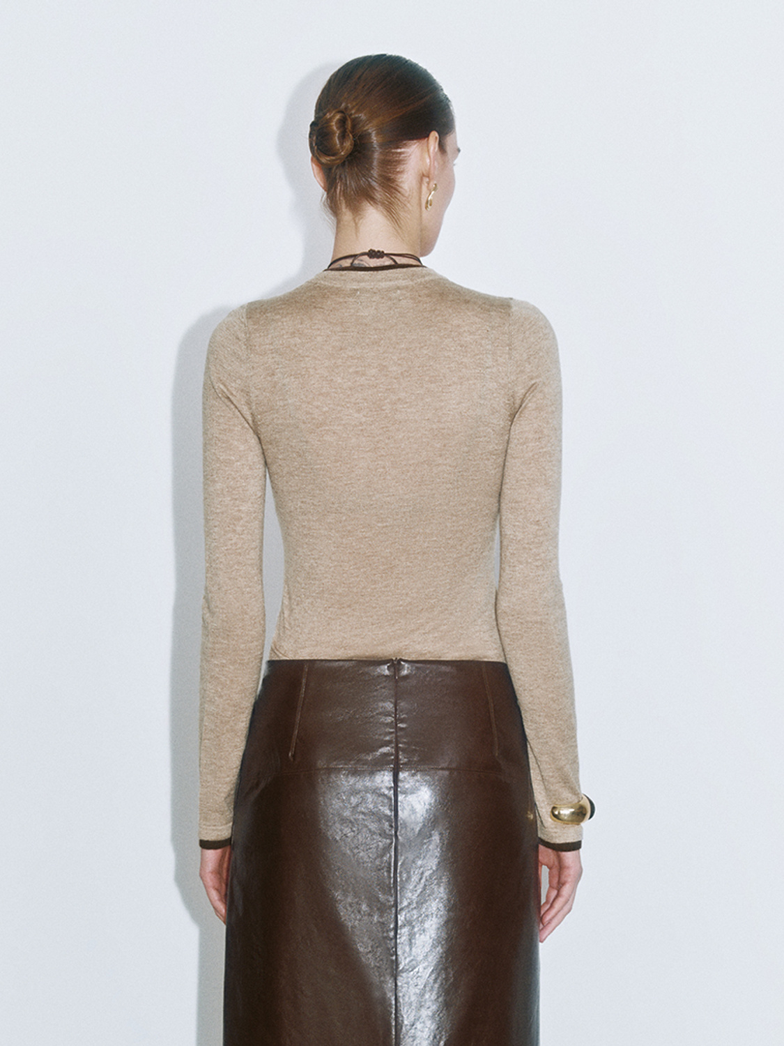 Tailor-Made Women's Fitted Cashmere Sweater and Leather Midi Skirt Ensemble