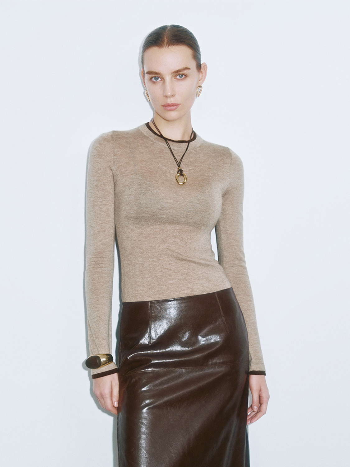 Tailor-Made Women's Fitted Cashmere Sweater and Leather Midi Skirt Ensemble