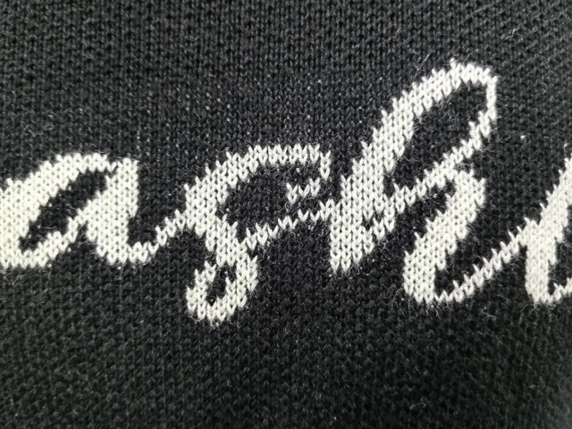 Customizable Minimalist Black Knit Sweater with Script Logo – Wholesale Manufacturer of Elegant Knitwear