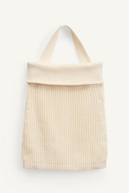 ODM Women's Knitted Sleeveless Top with Button Detail – Customizable Knitwear for Wholesale Retailers