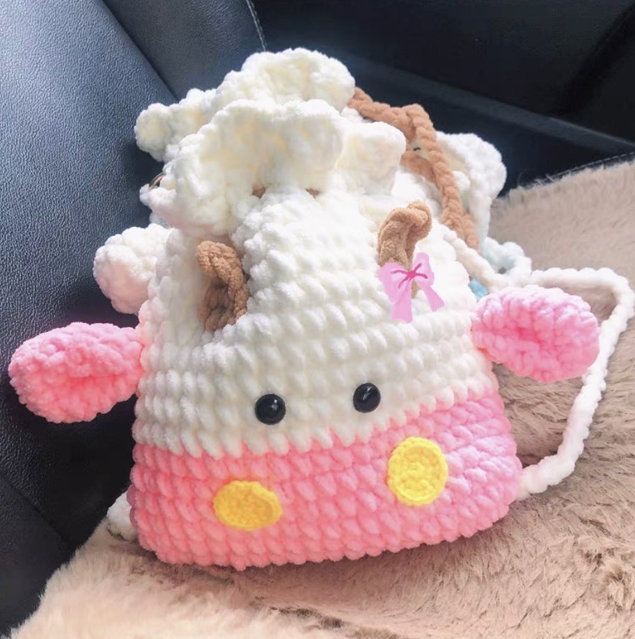 Handmade Plush Crochet Cow Drawstring Bag – Pink & White Velvet Yarn Backpack with Horns, Ears & Bow Accent
