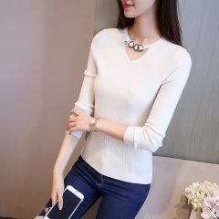 Personalized-Elegant Burgundy Knit Top with Cut-Out Neckline and Decorative Ring Detail