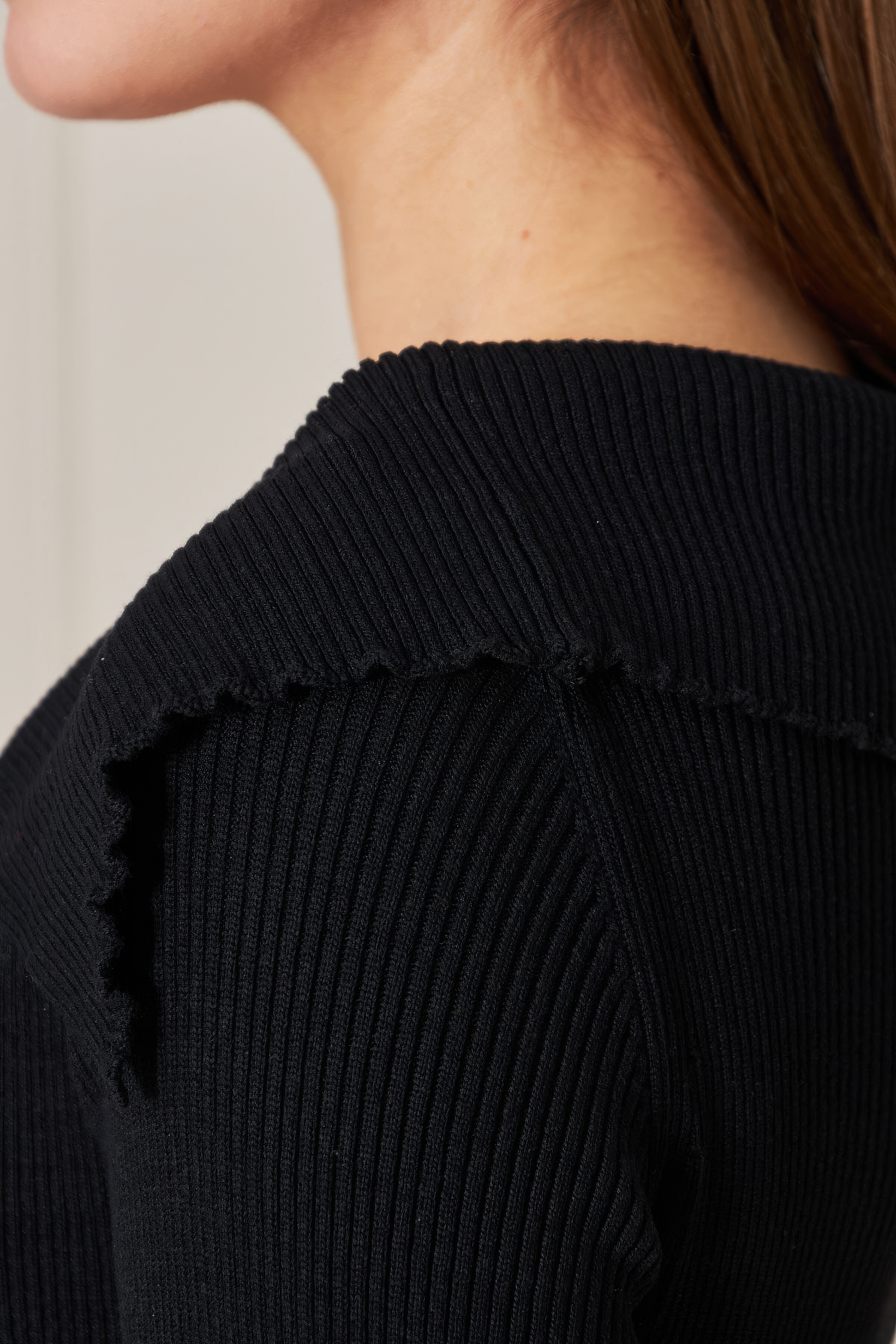 OEM ODM Women’s Black Long Sleeve Knit Top with V-Neck Detail