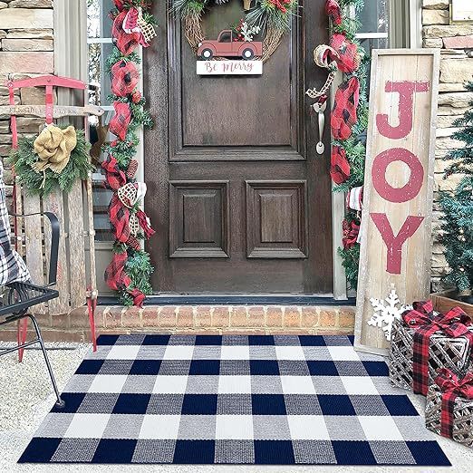 This front porch rug is soft and can be easily cleaned with a vacuum, hand-washed, or machine-washed.