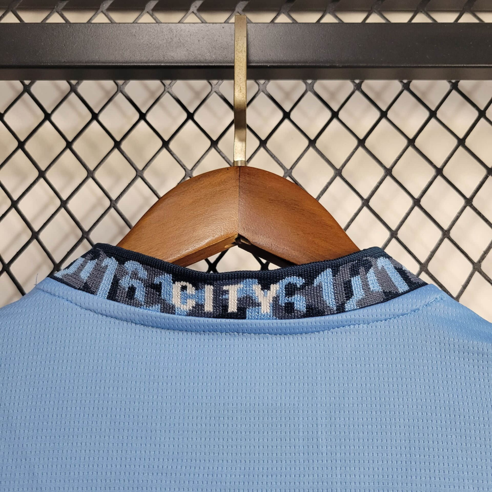 Manchester City home 24/25 kids football team shirt