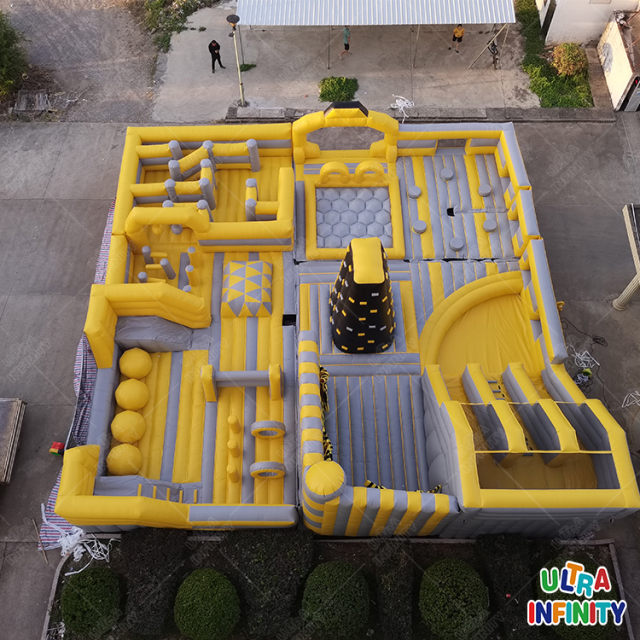 Inflatable theme park One large slide, One ball pit, one climbing wall, One leap n bound, One obstacle, One sticky wall