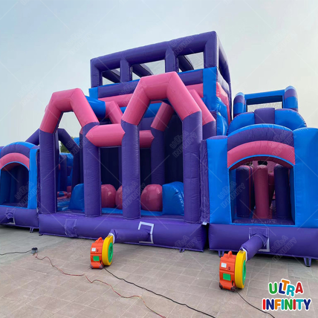 Inflatable theme park Large double slide One long obstacle One leap n bound One toddler area