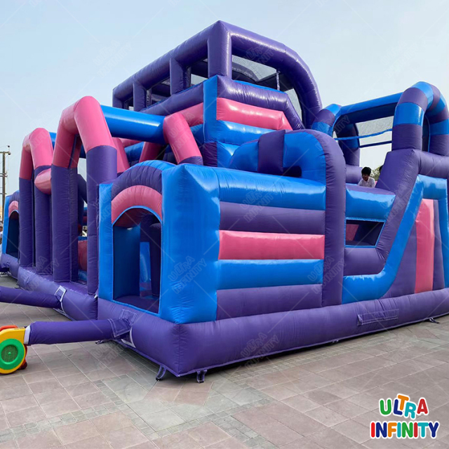 Inflatable theme park Large double slide One long obstacle One leap n bound One toddler area