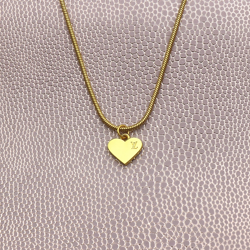 Louis Vuitton Gold Heart Designer Charm