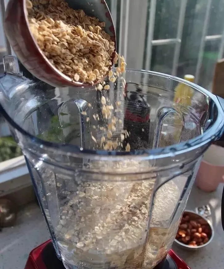 Put oatmeal, water, sea salt, maple syrup and coconut oil (if used) into a blender, press the juice button and stir for about 30-40 seconds