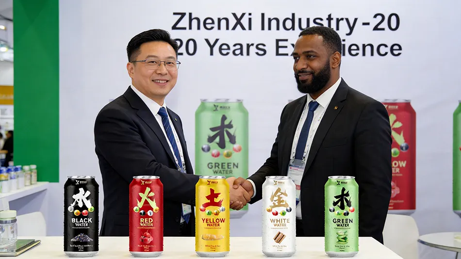 ZhenXi Industry sales expert consulting with international buyers on beverage OEM services for the Middle East and Africa markets