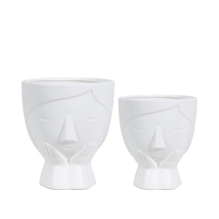 Face design ceramic plant pot