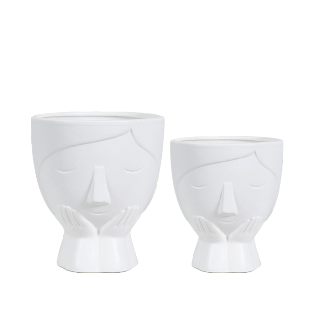 Face design ceramic plant pot