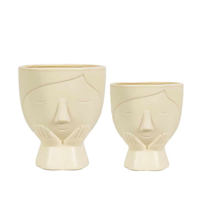 Face design ceramic plant pot