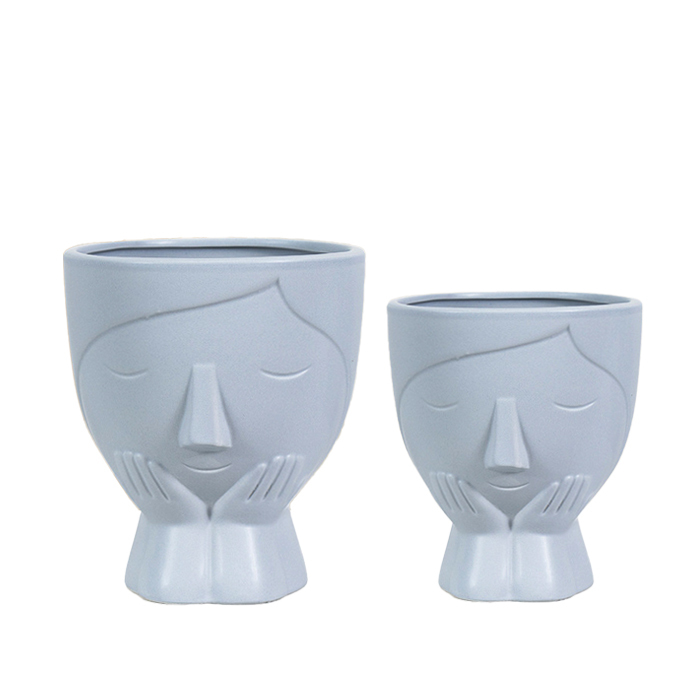 Face design ceramic plant pot