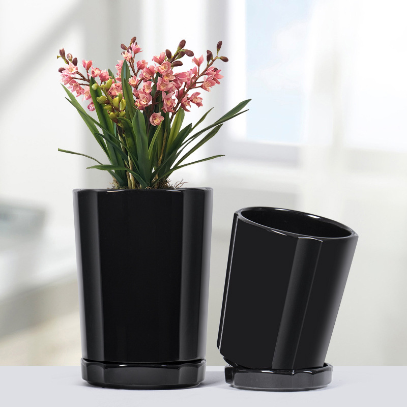 Set of 3 ceramic planter pots with saucers
