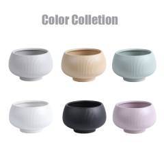 Matte glazed ceramic plant pot with fluted design