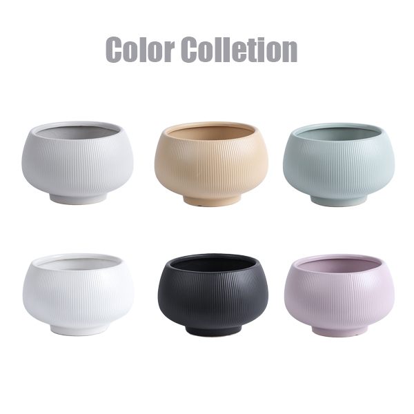 Matte glazed ceramic plant pot with fluted design