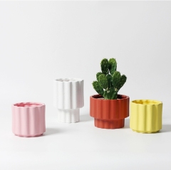 JYW2149 Fluted ceramic indoor plant pot with elevated bottom