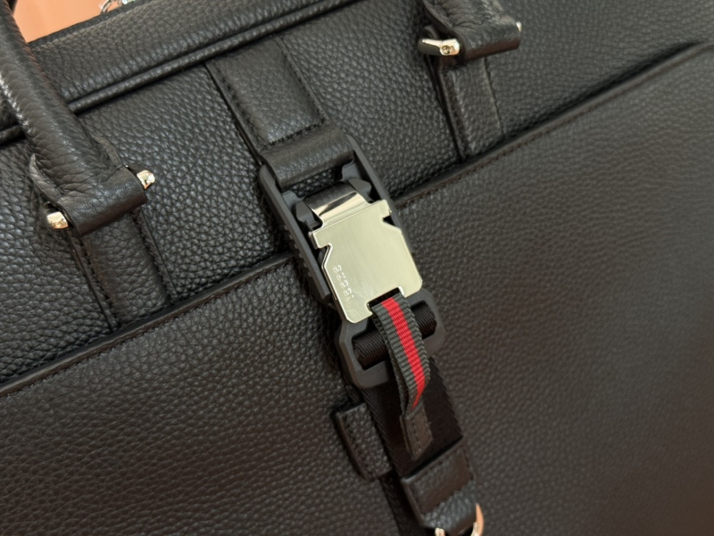 The briefcase is crafted with exquisite grain leather