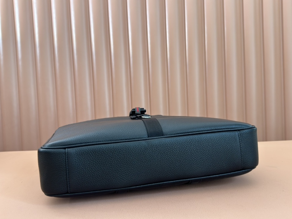 The briefcase is crafted with exquisite grain leather