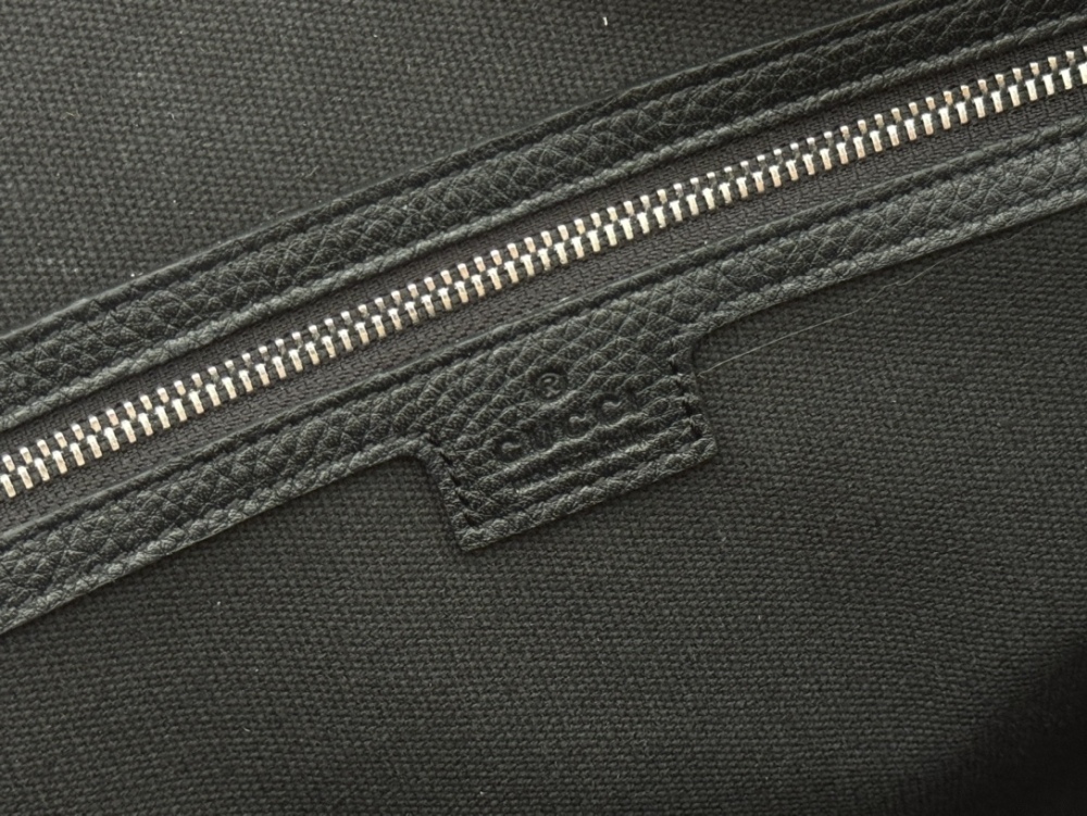 The briefcase is crafted with exquisite grain leather