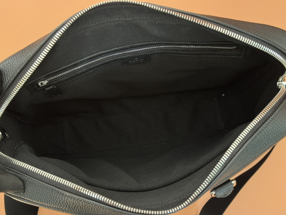 The briefcase is crafted with exquisite grain leather