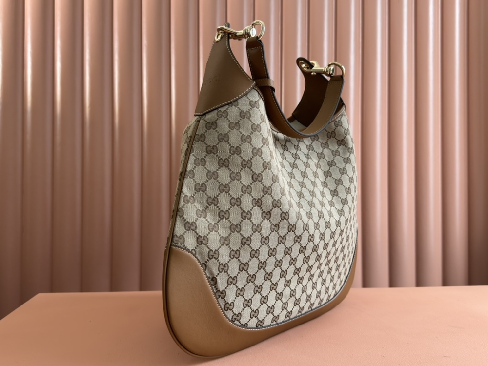 Double Lock Medium Shoulder Backpack