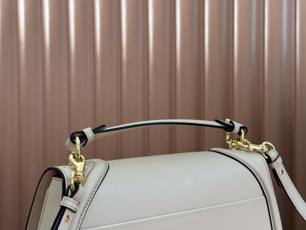 Medium round interlocking handbag