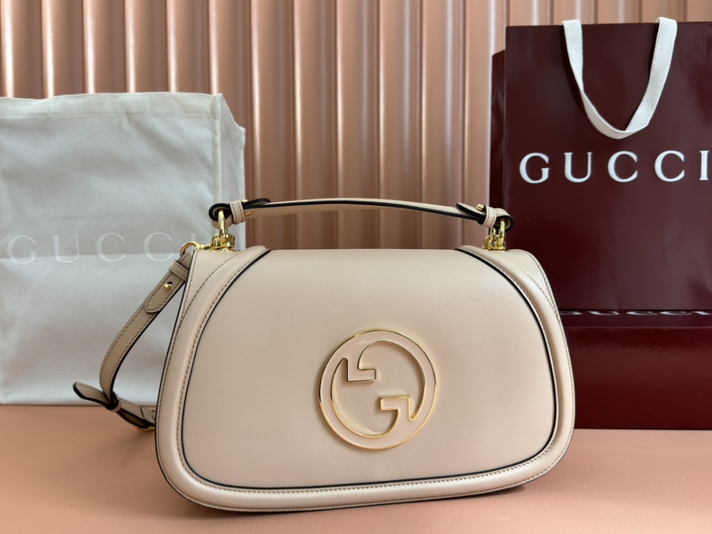 Medium round interlocking handbag