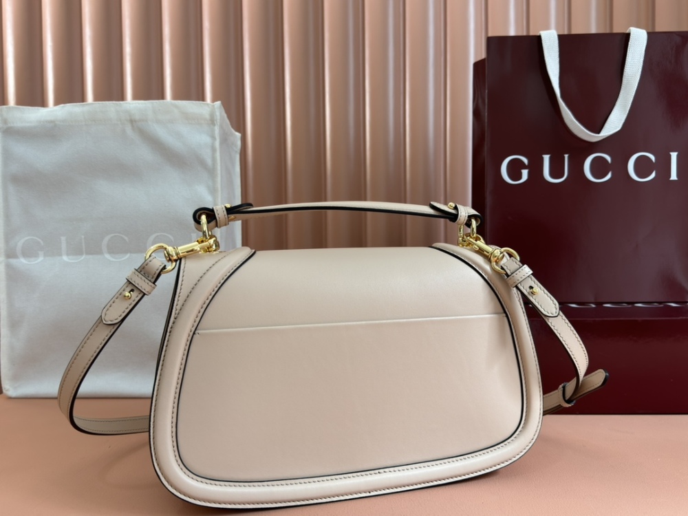 Medium round interlocking handbag