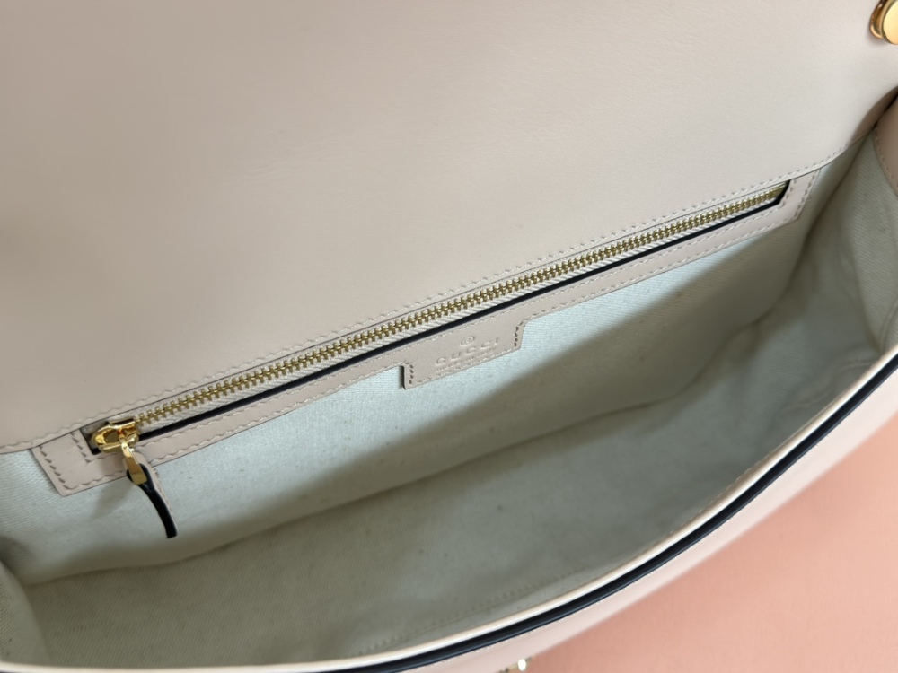 Medium round interlocking handbag