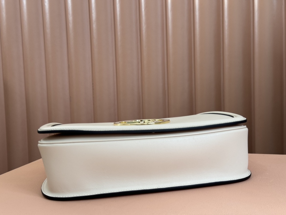 Medium round interlocking handbag