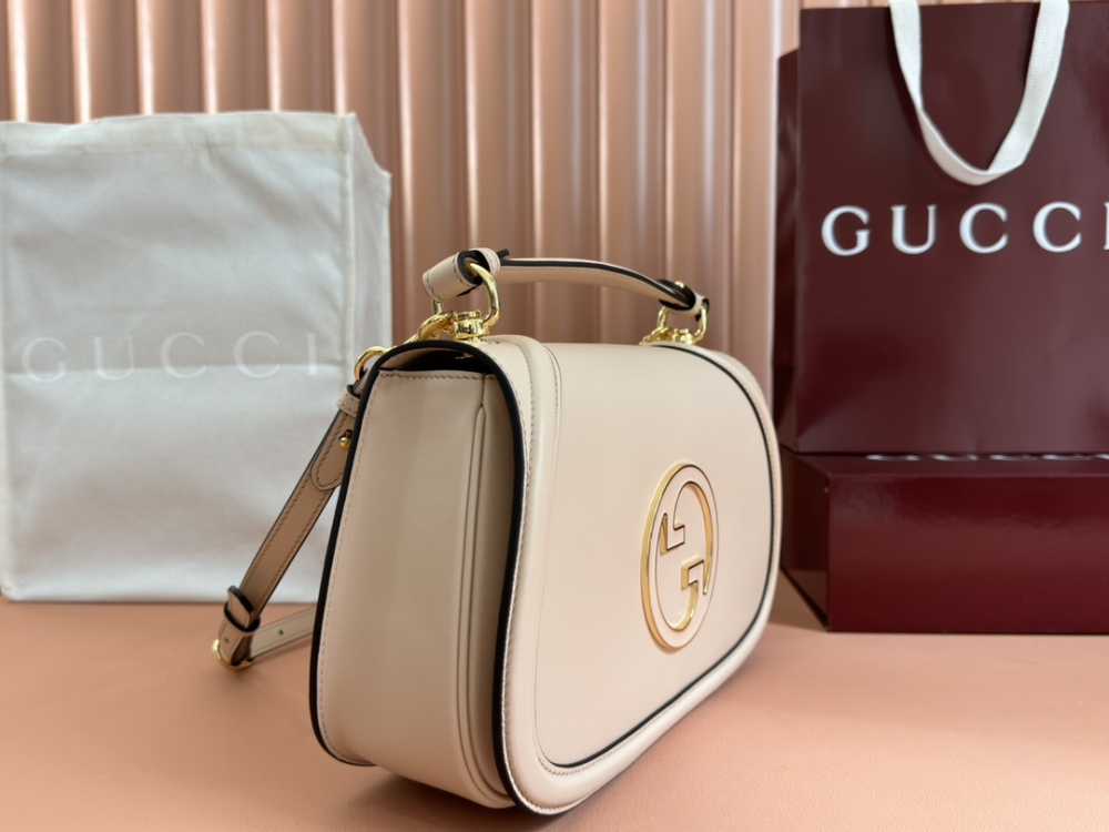 Medium round interlocking handbag