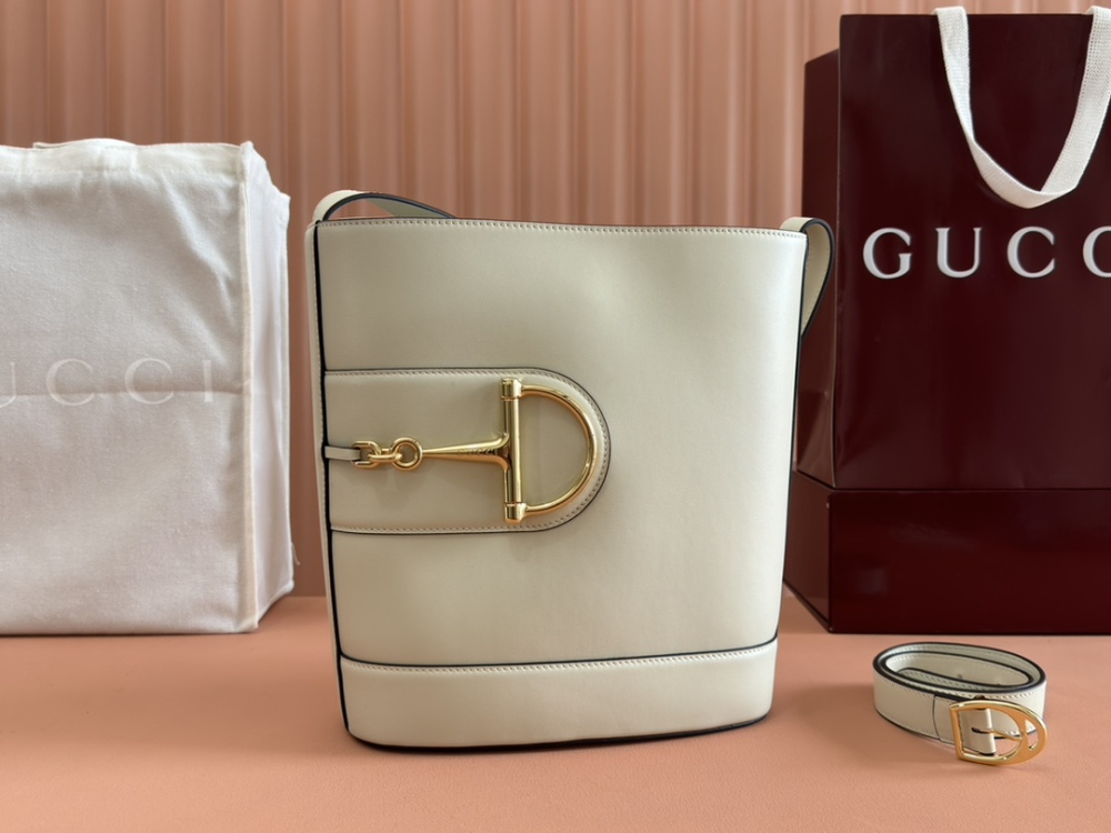 Horse carrying buckle crossbody bag