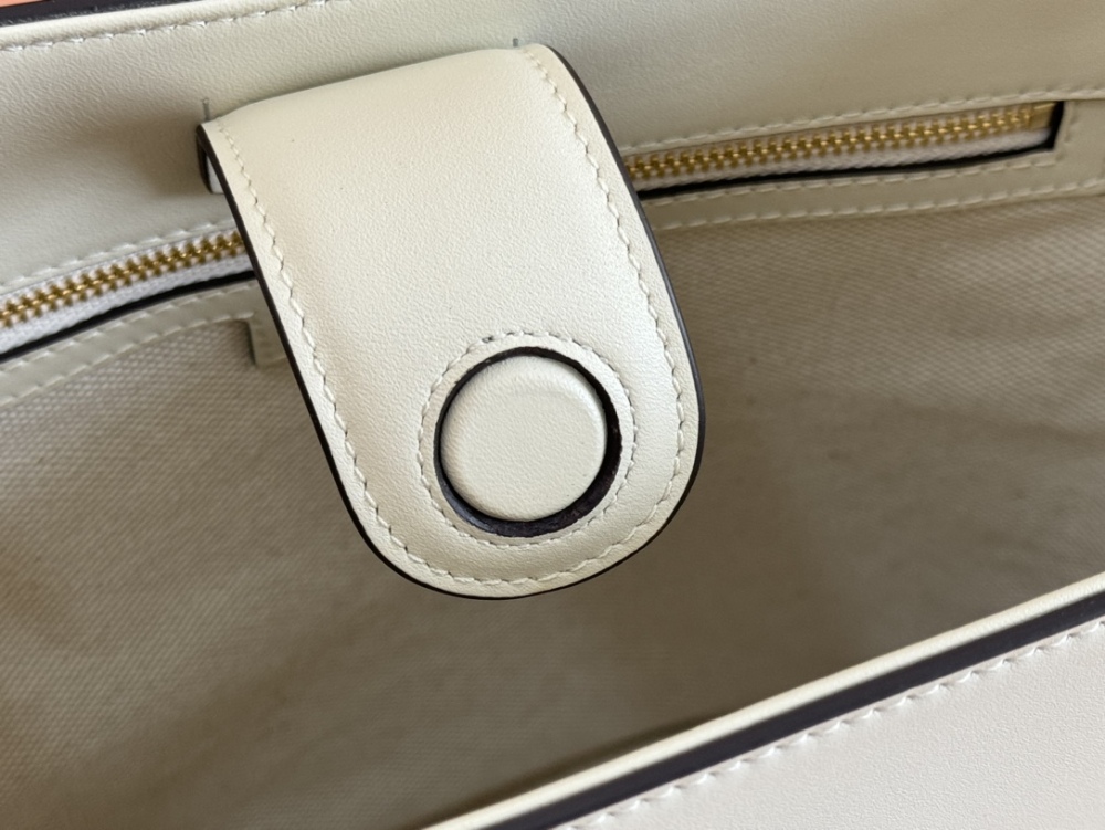 Horse carrying buckle crossbody bag