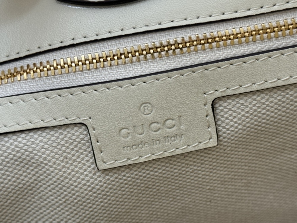 Horse carrying buckle crossbody bag