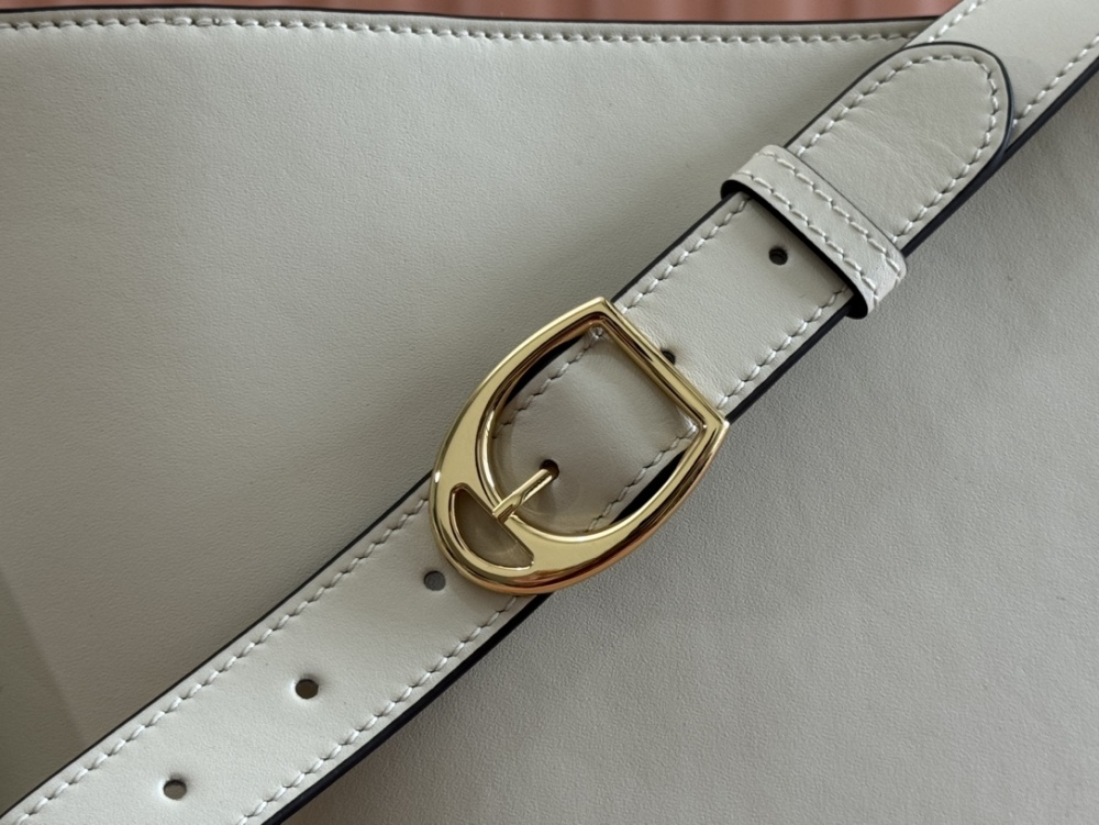 Horse carrying buckle crossbody bag